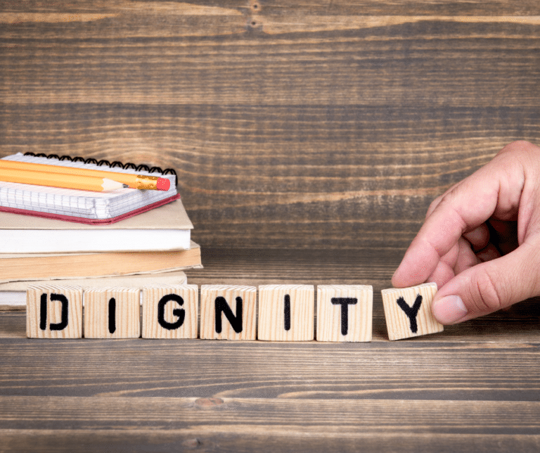 The word "dignity" is spelt with blocks.